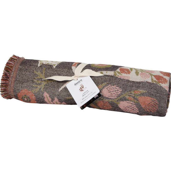 Danica Catbloom throw blanket from Now Designs featuring a vibrant floral pattern on soft, cozy fabric.