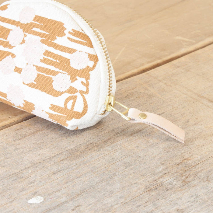 Erin Flett Darlene Pouch in Sienna Meadow with floral design, compact leather bag for accessories and essentials.