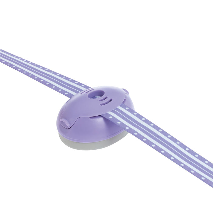 Soft Sounds Baby Earmuffs | Purple are purple earmuffs with an adjustable headband, sized similarly to a handheld tape dispenser with decorative lavender tape featuring white stripes and dots, shown on a white background.